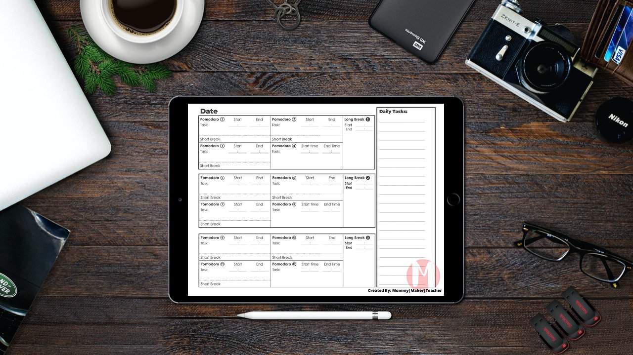 ipad on desk with the pomodoro technique printable planner
