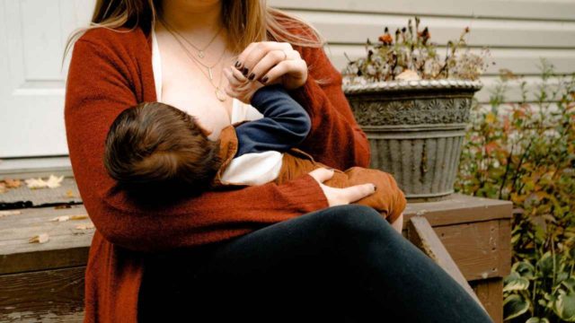 mother breastfeeding toddler