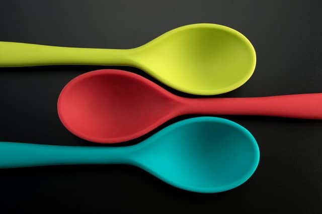 green, red, and blue kitchen rubber spatulas