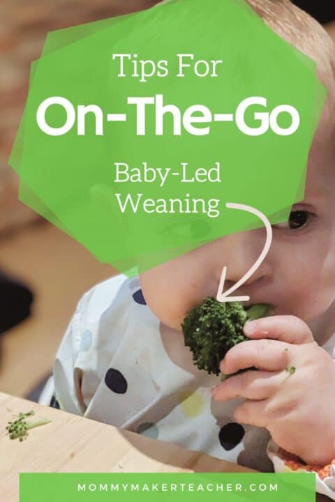 Baby eating brocoli with hands at a restaurant. Tips for on-the-go baby led weaning. Mommymakerteacher.com