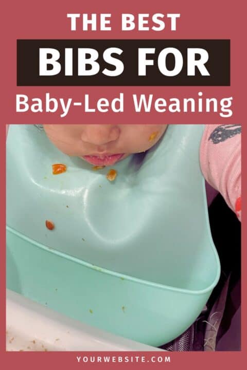 Baby wearing silicone bib in high chair. The best bibs for baby-led weaning. Mommymakerteacher.com