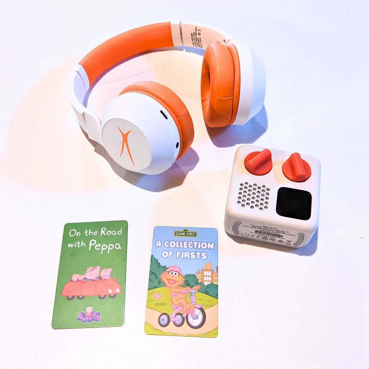 Yoto Mini with Lansing wireless headphones. 